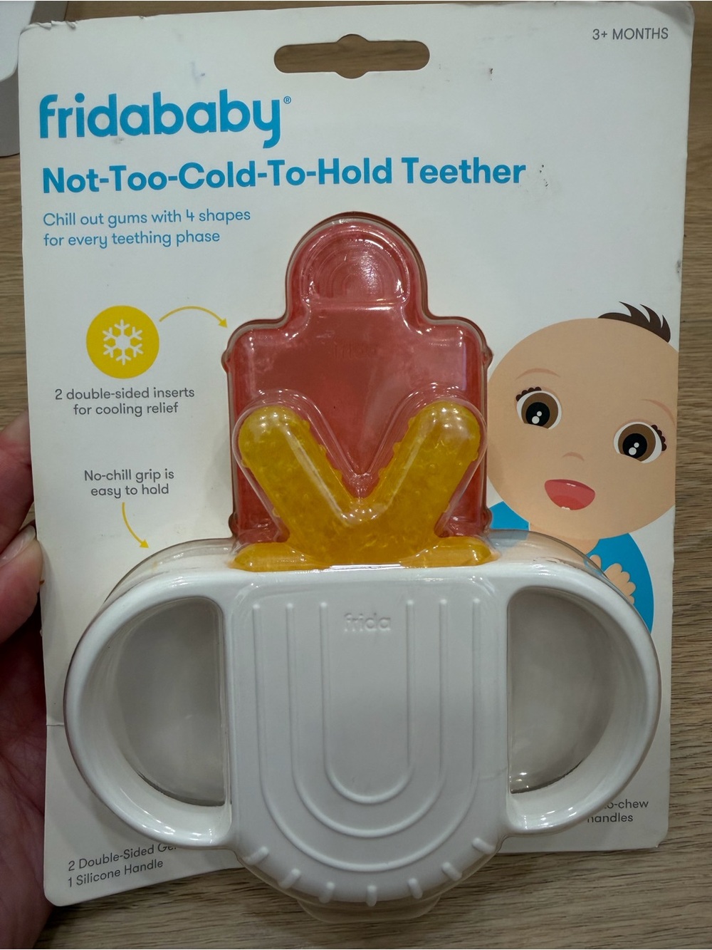 fridababy Not-Too-Cold-To-Hold Teether – White & Yellow